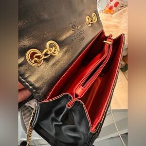 Chanel Black Shoulder Bag with Red Interior